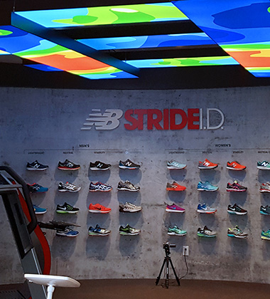 New balance, stride sign on wall